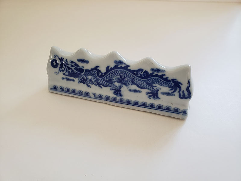 Blue and White Porcelain Brush Rest with Dragon Pattern: Essential Tool for Traditional Artistry