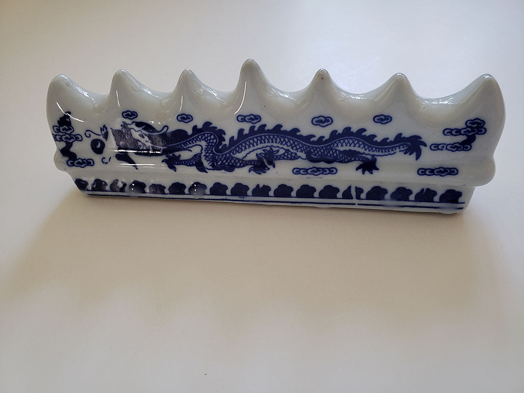 Blue and White Porcelain Brush Rest with Dragon Pattern: Essential Tool for Traditional Artistry