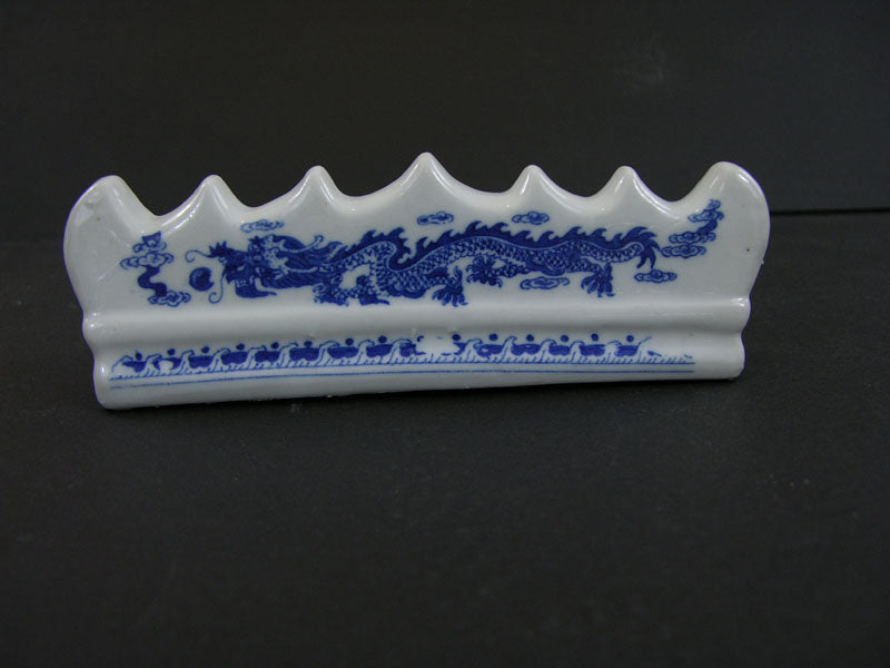 Blue and White Porcelain Brush Rest with Dragon Pattern: Essential Tool for Traditional Artistry